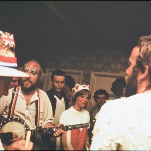 People singing in pub in fancy dress