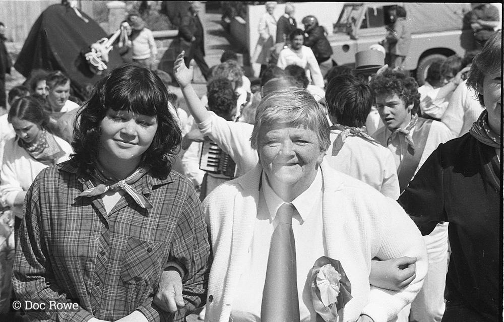 Women smiling, Old Oss in background