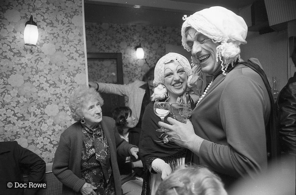 Merrymakers dressed up in pub