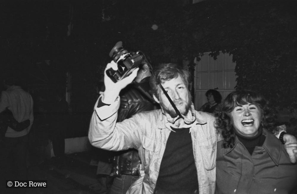 man with camera outside