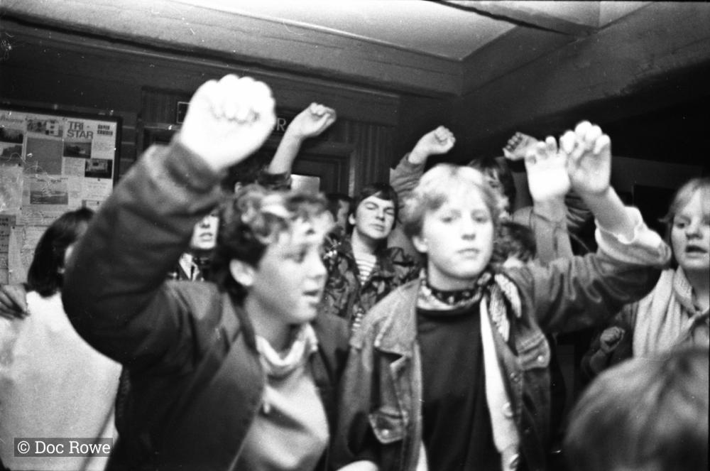 Youth singing indoors