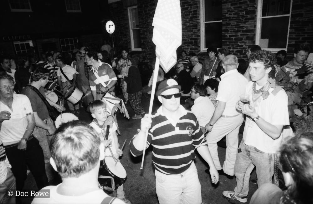 people dancing w flag
