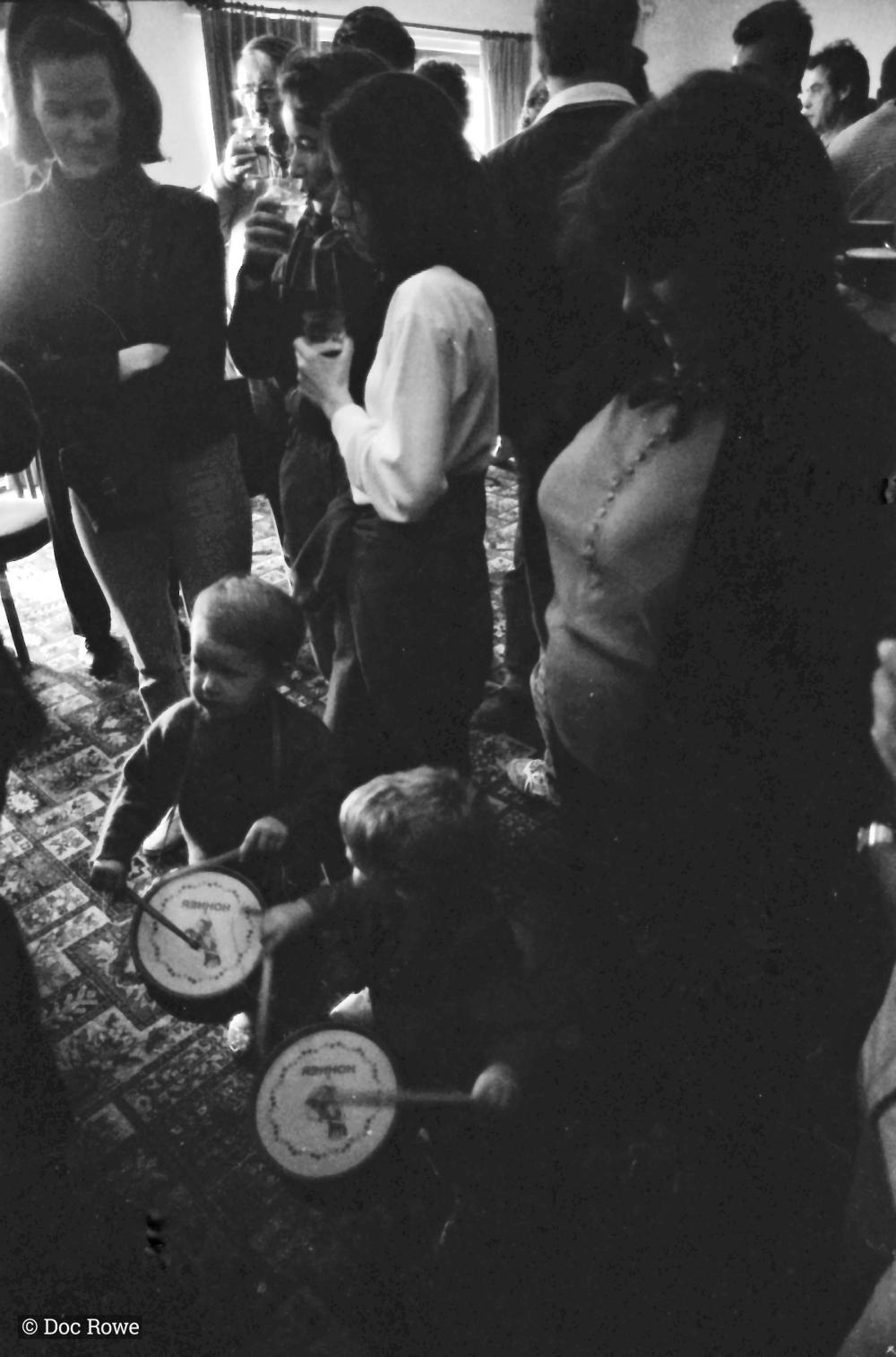 children playing drums in pub