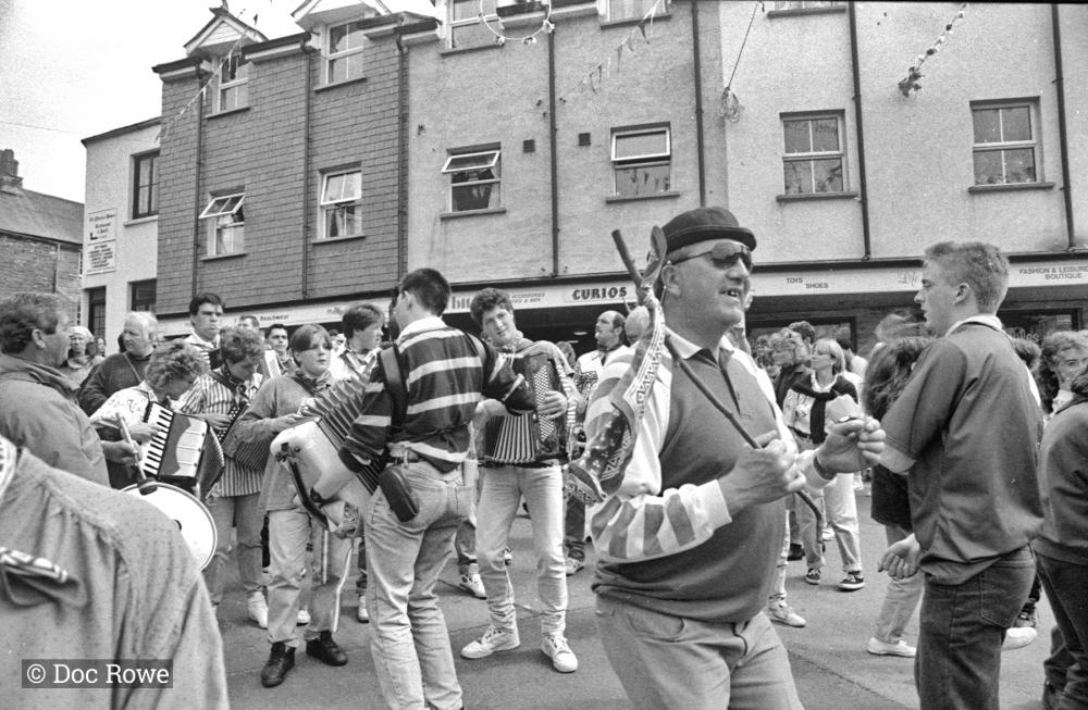 people playing instruments in street on 2nd of May