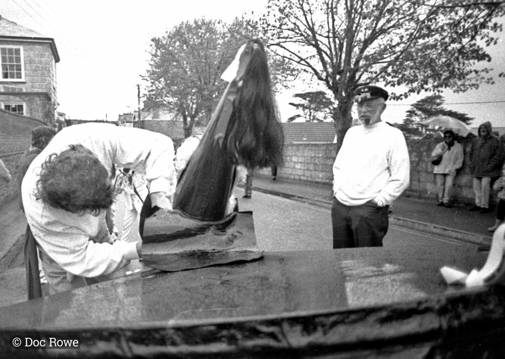old oss hat being adjusted