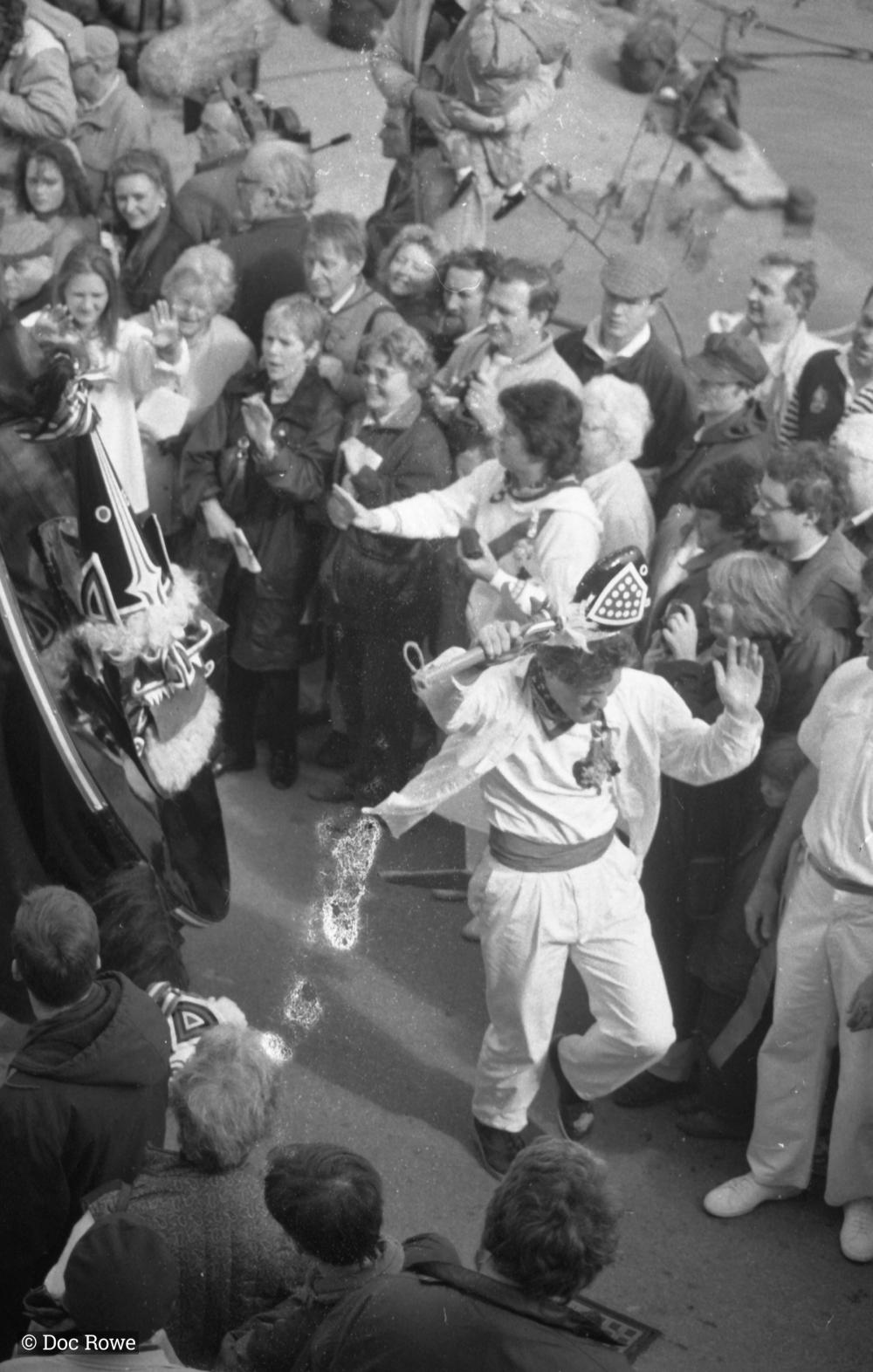 man teasing blue ribbon