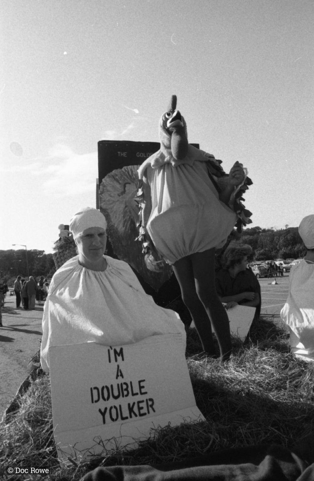 people in costumes on carnival float