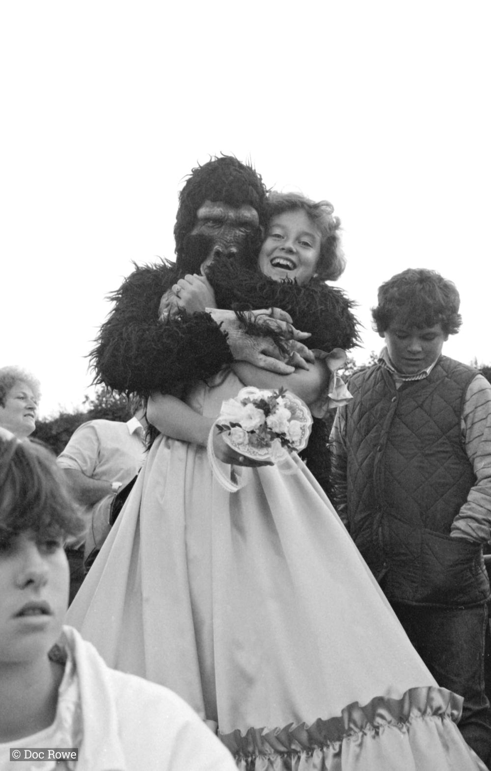 gorilla hugging carnival queen