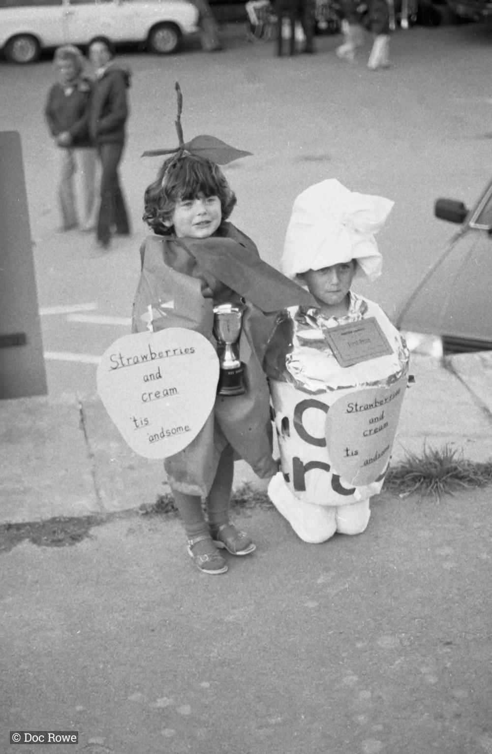 children dressed as strawberries and cream