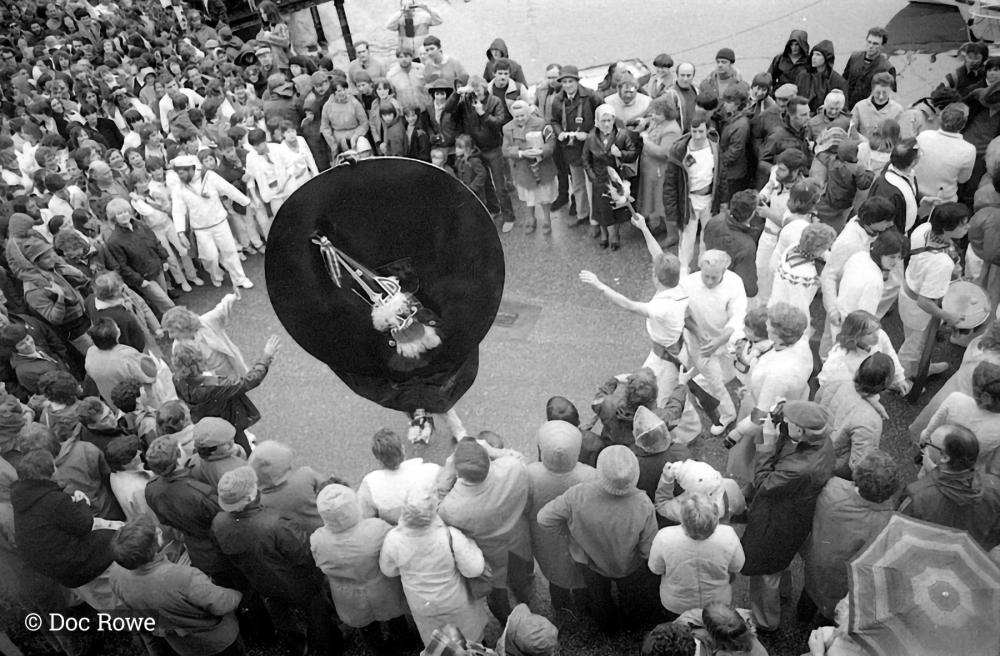 Looking down at Blue Ribbon Oss circled by crowds