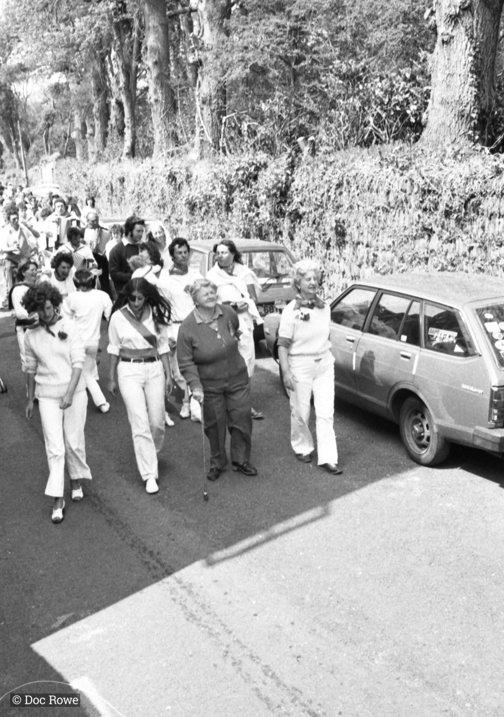 women walking in procession