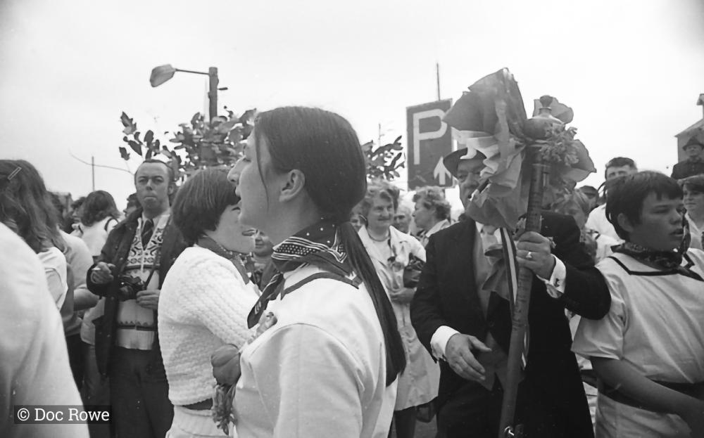 blue ribbon master of ceremonies in crowd