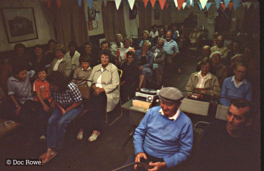 People watching projector
