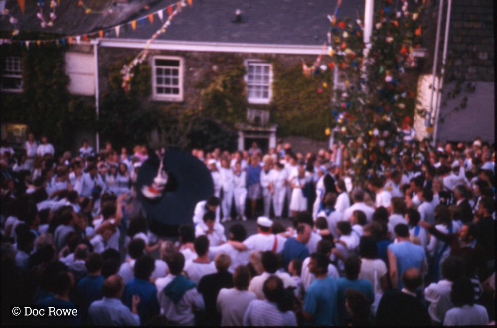 Blue Ribbon Oss being teased under maypole