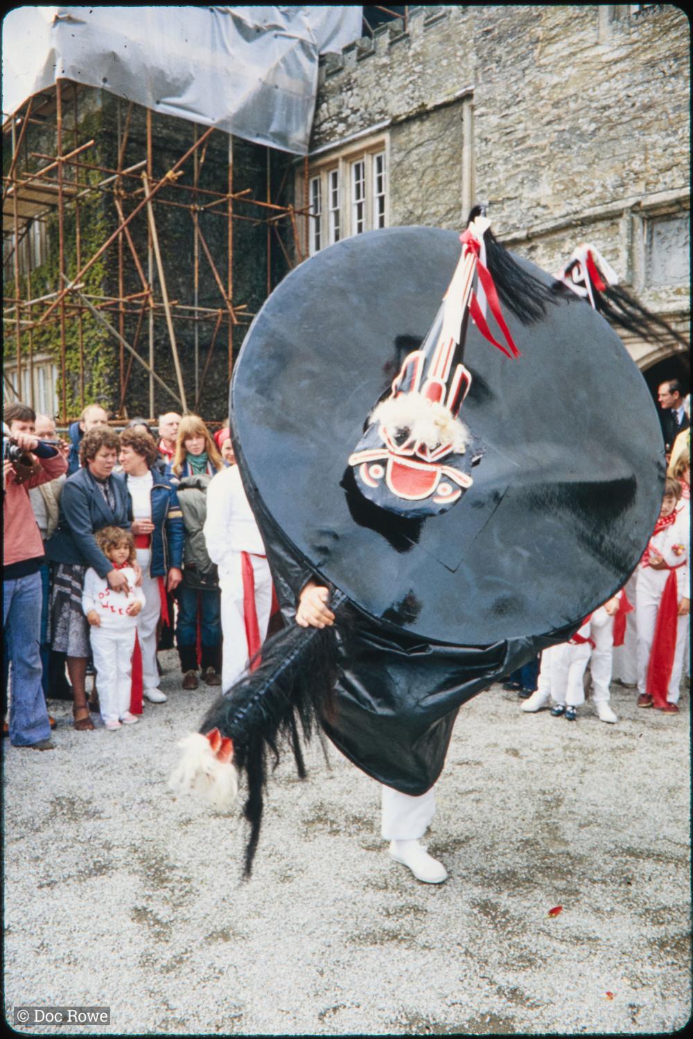 Old Oss dancing outside Prideaux Place house