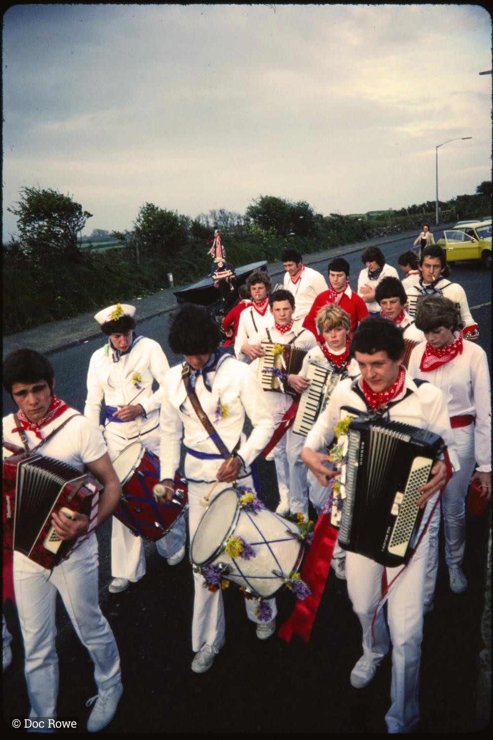 Early morning, Children's Oss band  walking along road