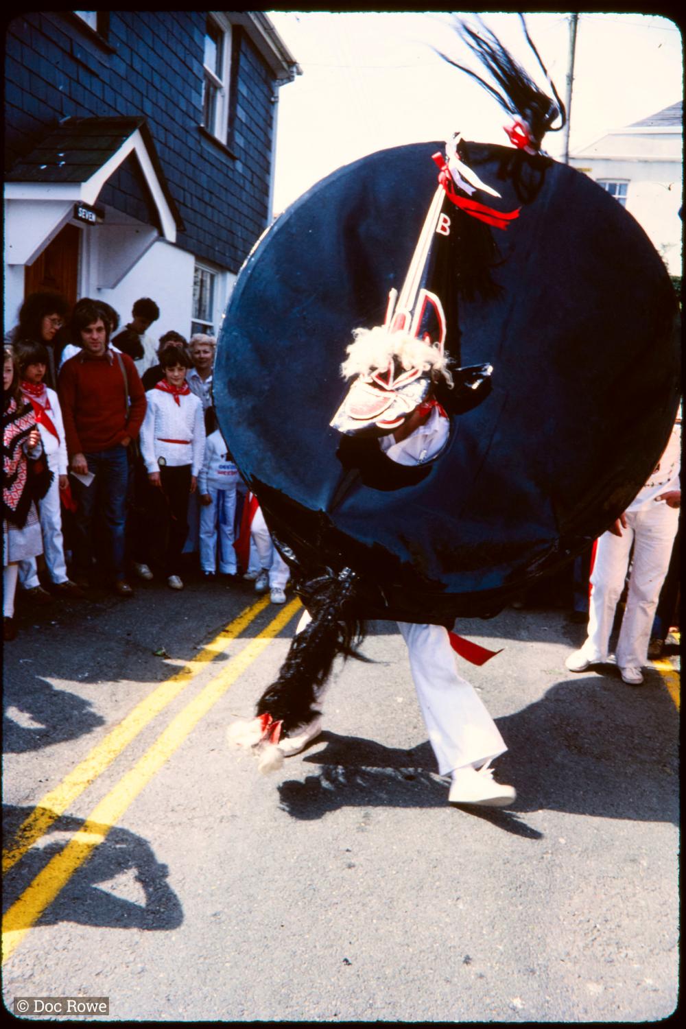 Old Oss being teased in procession