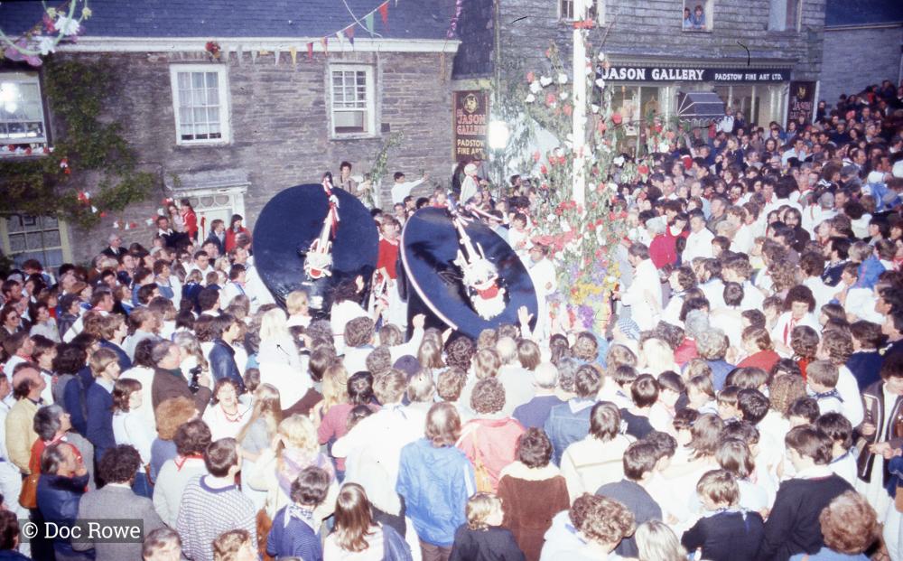 Crowds gathered under the maypole with the osses