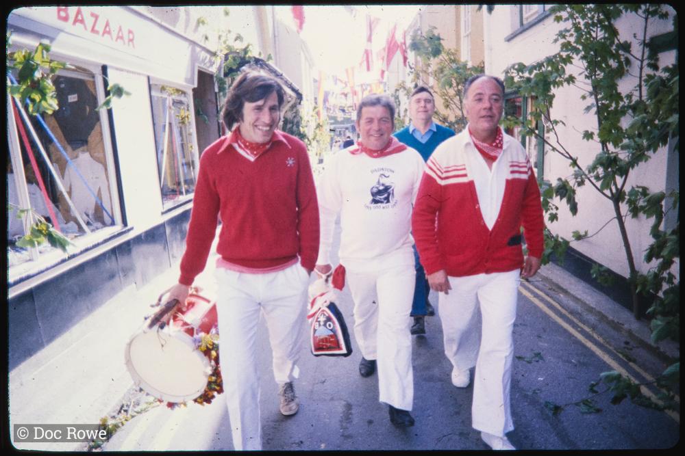 Early morning, Old Oss members on their way to the procession
