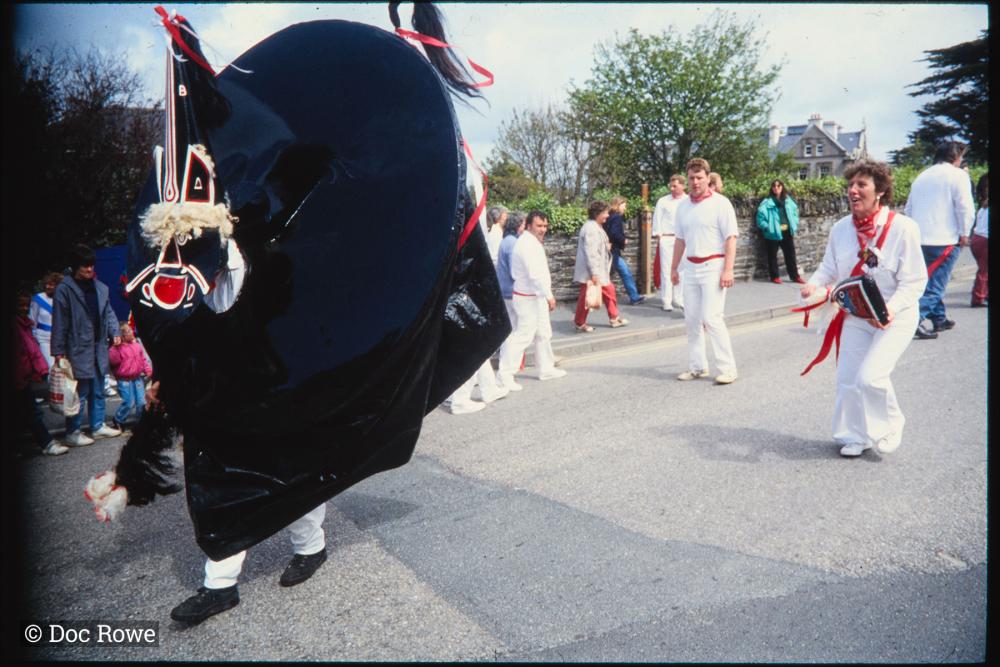 Woman teasing Old Oss in road