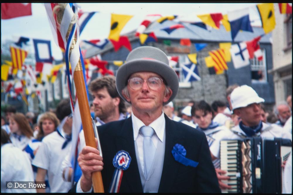 Blue Ribbon Master of Ceremonies walking in procession