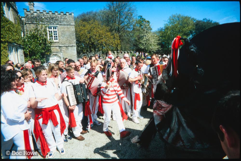 Old Oss being teased outside Prideaux Place house